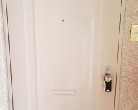 東京都豊島区マンションの鉄扉（ドア）塗装工事の施工事例
